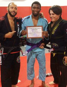 Nate earning his Purple Belt in Muay Thai.