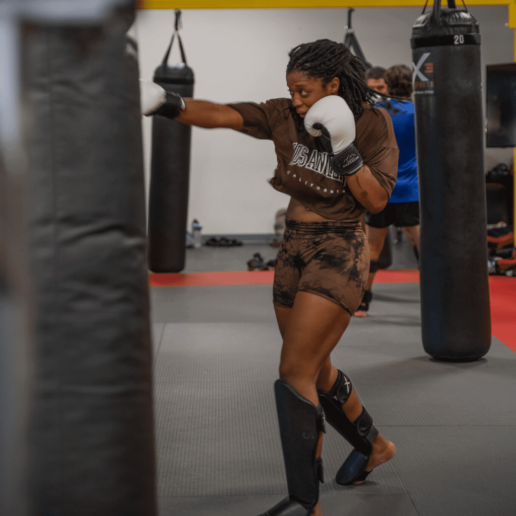Image of a female boxer at X3 sports.