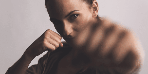 Female boxing fitness at X3 Sports West Midtown.