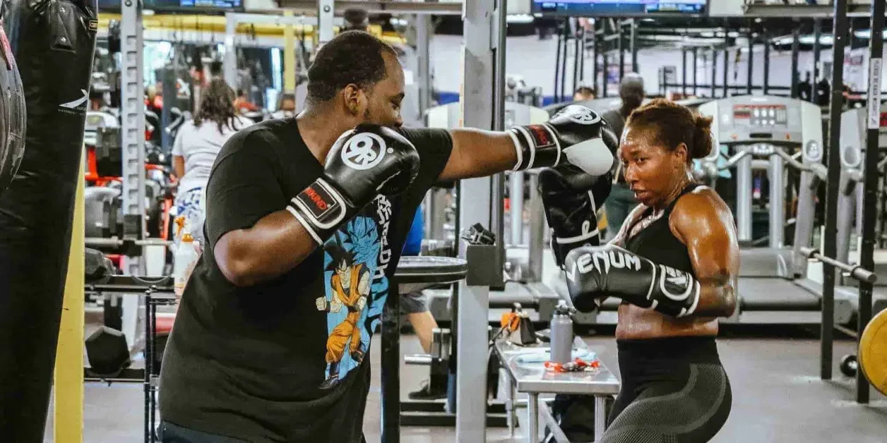 Woman practicing boxing exercise workout for jab technique